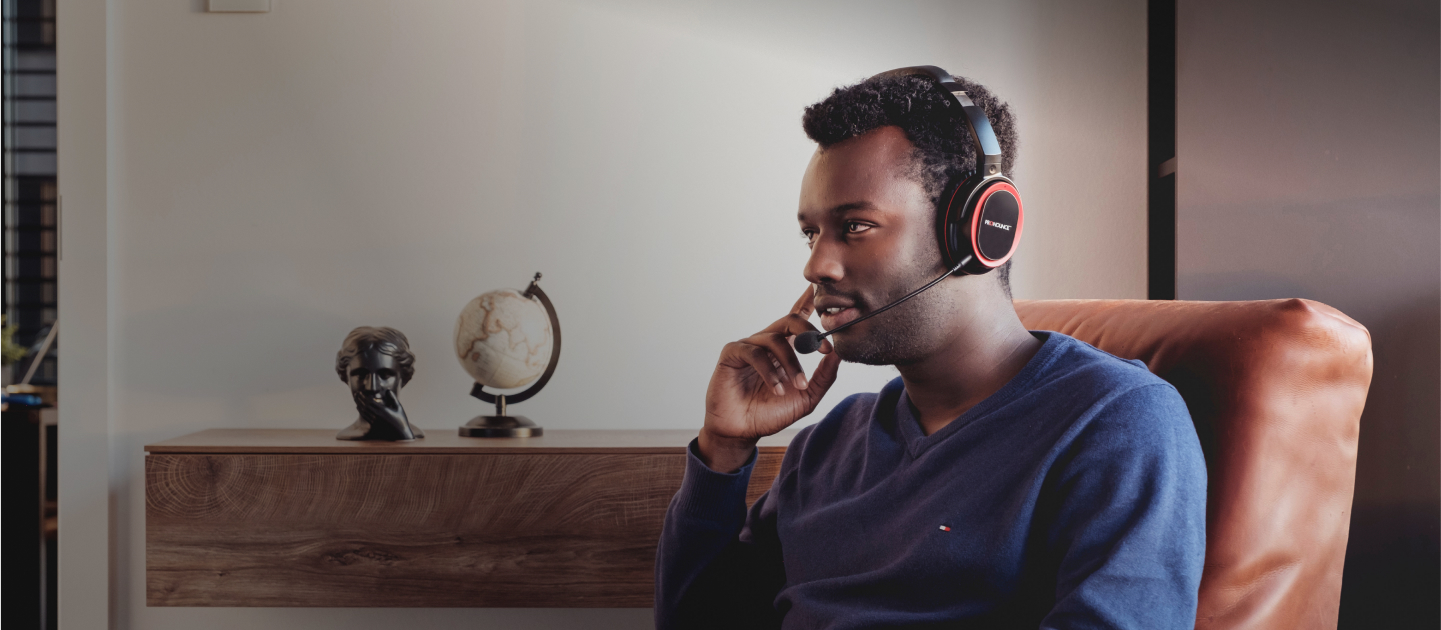 Man improving his english with the Pronounce headset